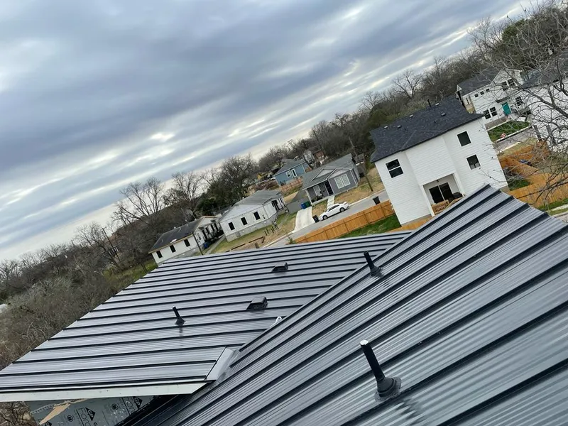 Standing seam metal roof panels with vents for Skylight Repair in Geneseo